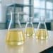 Laboratory vials and beakers with deep eutectic solvent formulations replacing toxic industrial solvents